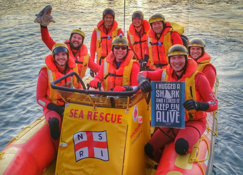 The National Sea Rescue Institute pose with fin