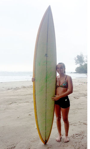 Kaya with her board. Photo: Lisa Lucas