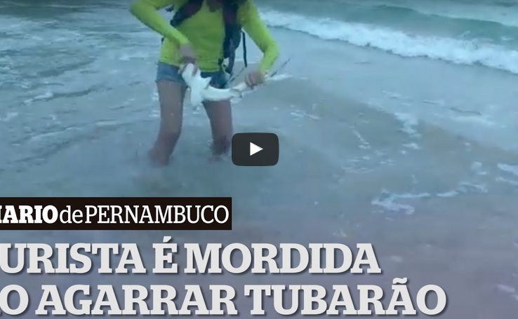 grabbed a shark for a selfie and got bitten