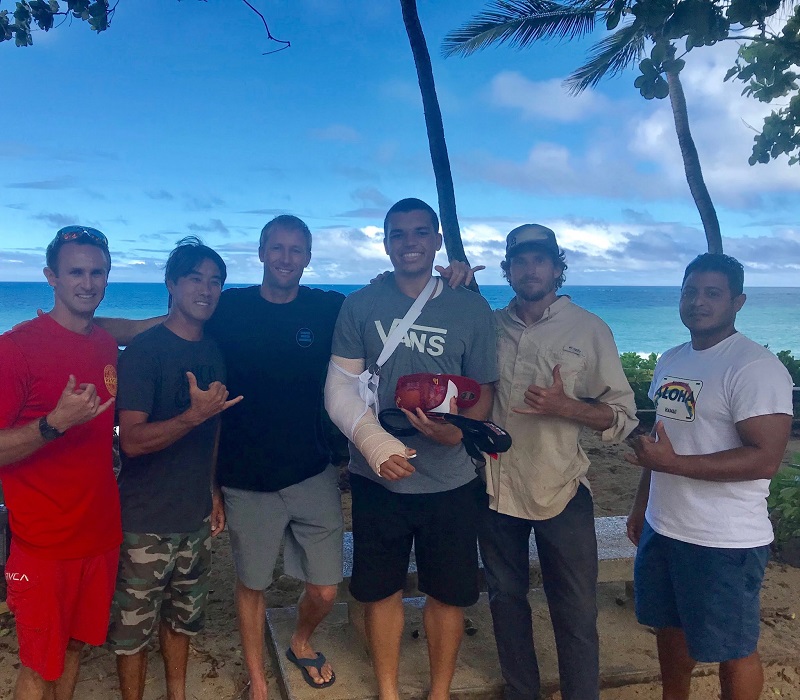 Shark attack survivor Juliun Perkins and his lifesavers.